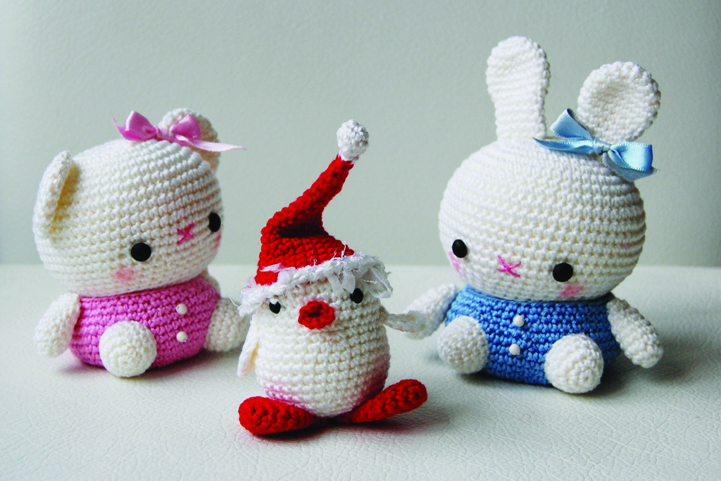 Crochet bear and bunny box together with the chick in Santas hat.