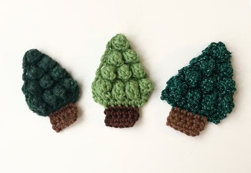 Three Christmas tree ornaments