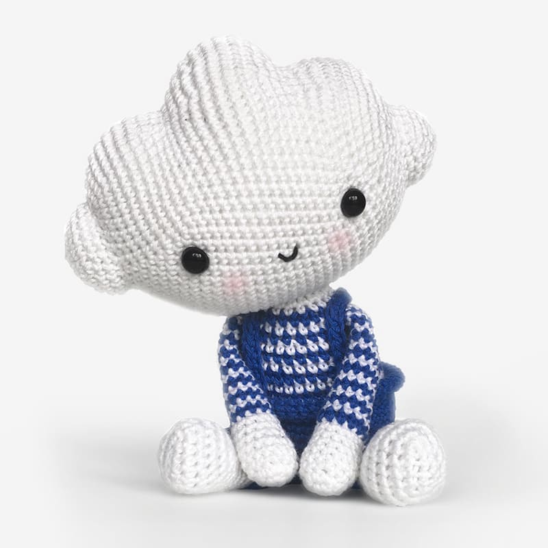 Amigurumi Crochet Cloud Doll, wearing stripped shirt and blue shorts.